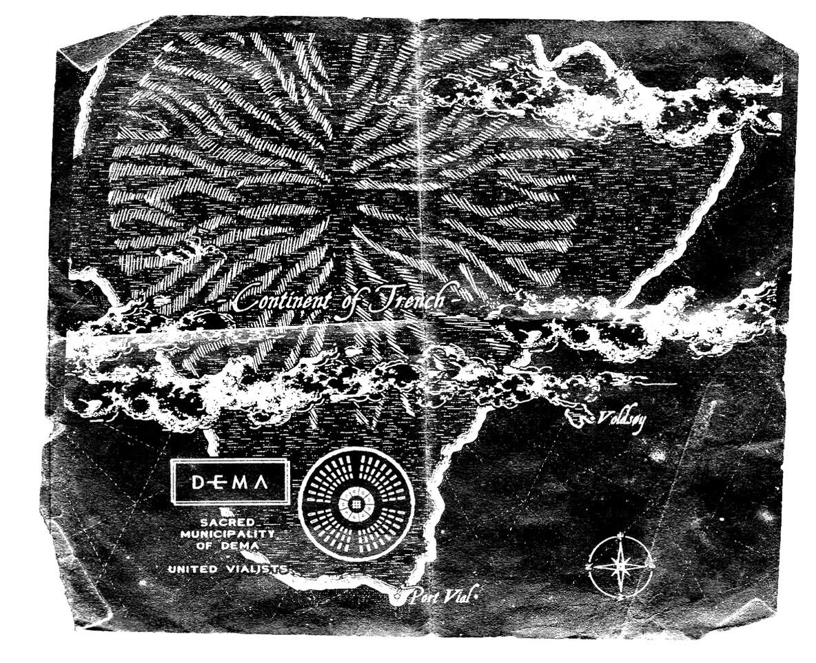 Alt text: Scan of a black map showcasing the aerial view of a coastal piece of land named “Continent of Trench”. A vast valley encased by a circular mountainous region covers the upper left center of the map; on the lower center, the Sacred Municipality of Dema can be seen; below it, a dot displays an area named “Port Vial” along the shoreside. A small island named “Voldsøy is displayed near the continent. The compass from the original DEMA map also appears in the lower right corner, but now with East pointing up.